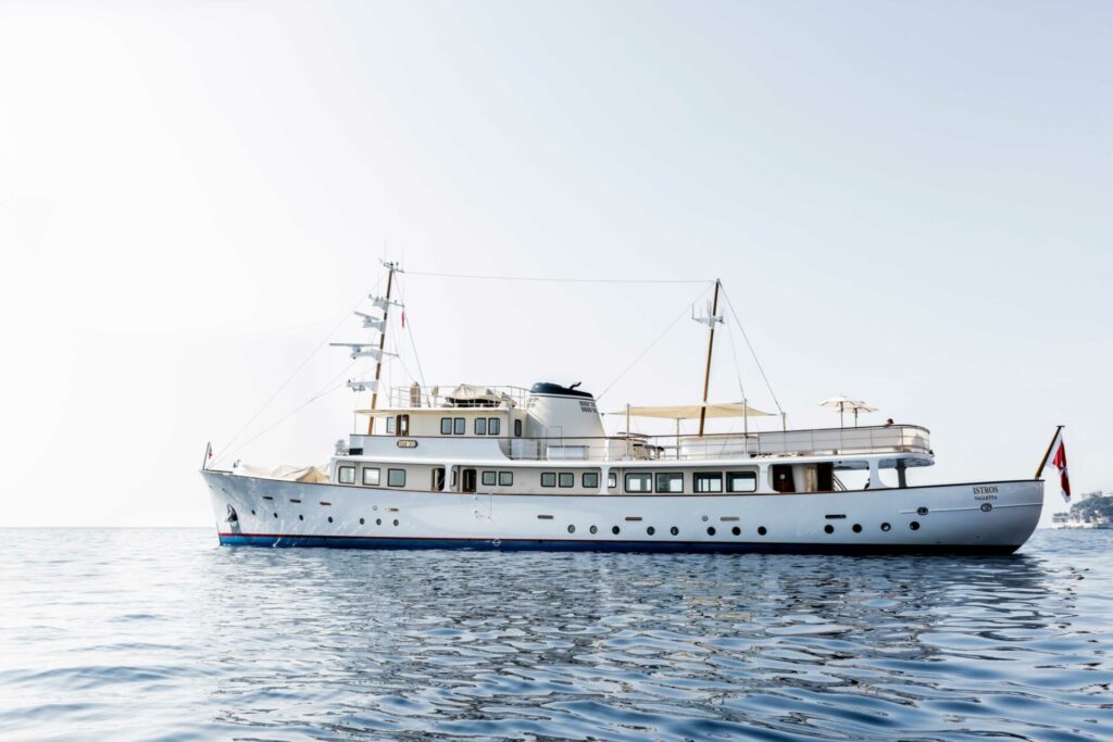 Luxury yacht Istros with elegant exterior and refined interior design, representing timeless craftsmanship and the harmony between luxury yacht interior and exterior design.