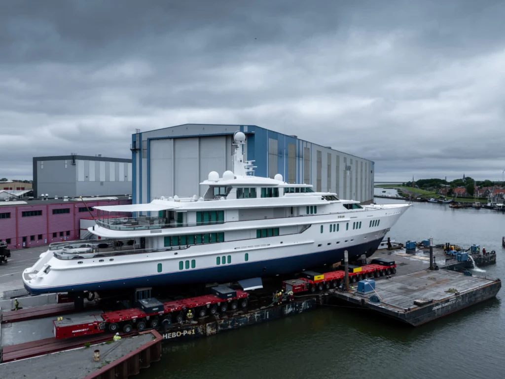 Luxury yacht at the shipyard during refit and maintenance, illustrating large-scale yacht service and restoration work focused on quality and precision.